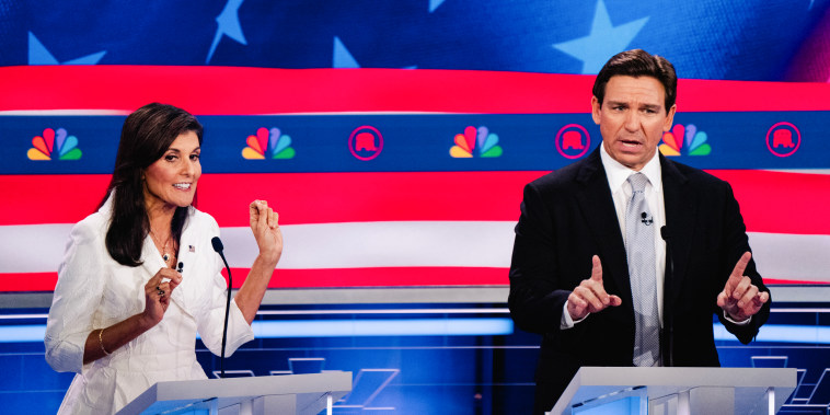 Nikki Haley and Florida Gov. Ron DeSantis speak during the third Republican presidential primary debate in Miami, Fla. on Nov. 8, 2023.