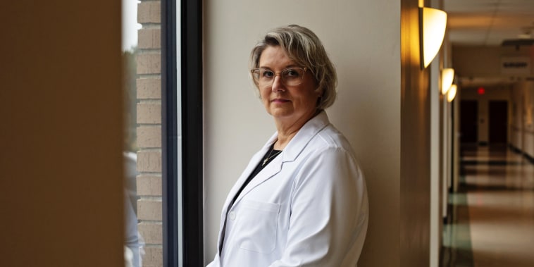 Dr. Powell in the hall of the labor and deliver wing at Monroe County Hospital in Monroeville, Ala.