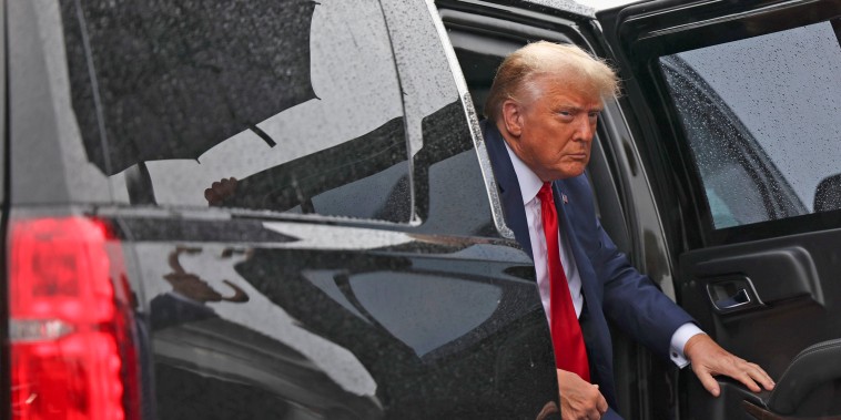 Former President Donald Trump arrives at Ronald Reagan Washington National Airport on Aug. 3, 2023, after appearing in federal court.