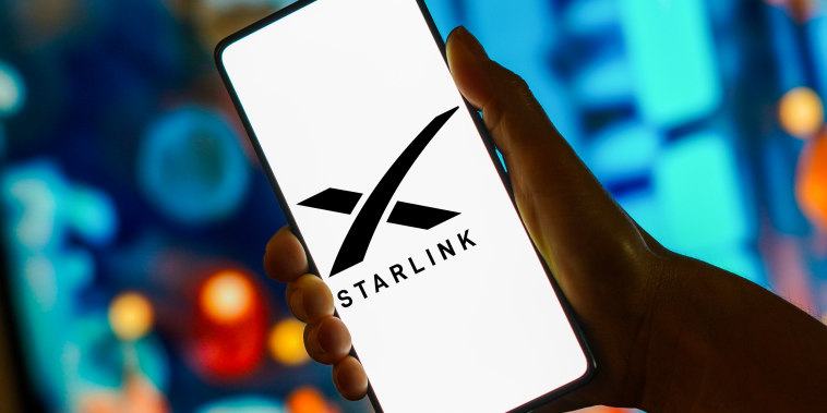 The Starlink logo is displayed on a smartphone in Brazil on Nov. 11, 2023.