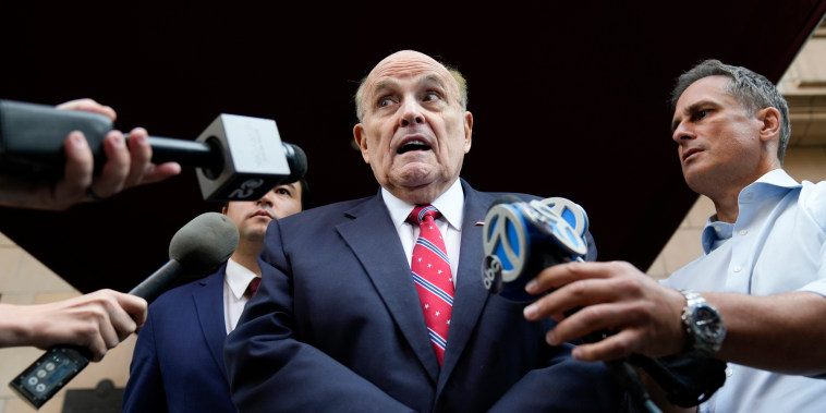 Image: Rudy Giuliani speaks to reporters