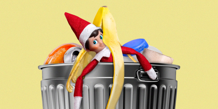 An elf on the shelf in a garbage can 