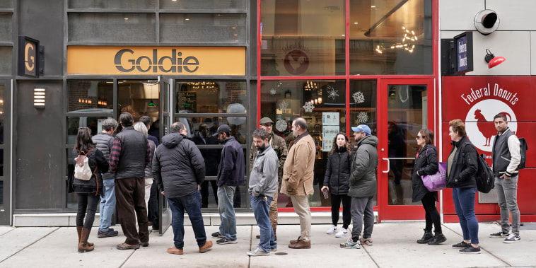 Customers line up for lunch at the Goldie falafel restaurant in Philadelphia, on Monday, Dec. 4, 2023, the day after marchers calling for the end of the siege in Gaza gathered outside the restaurant.