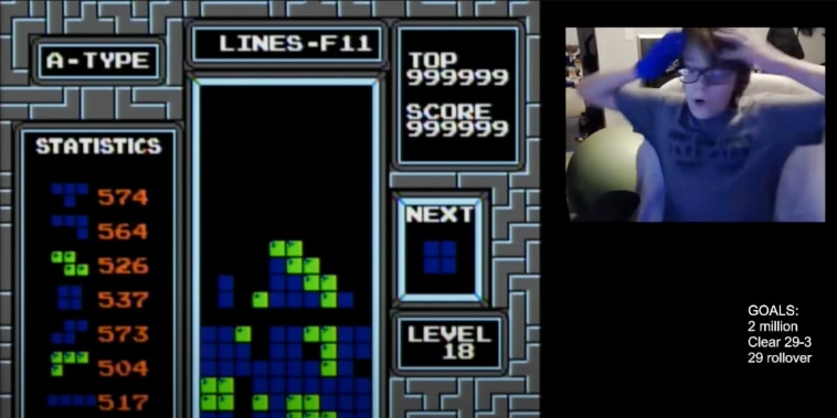 A screenshot of a 13-year-old boy beating Tetris.