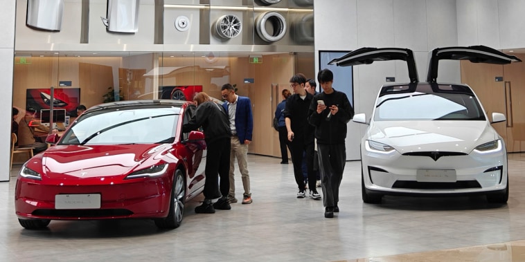 https://media-cldnry.s-nbcnews.com/image/upload/t_focal-758x379,f_auto,q_auto:best/rockcms/2024-01/240105-tesla-china-mn-0855-7c4bcb.jpg