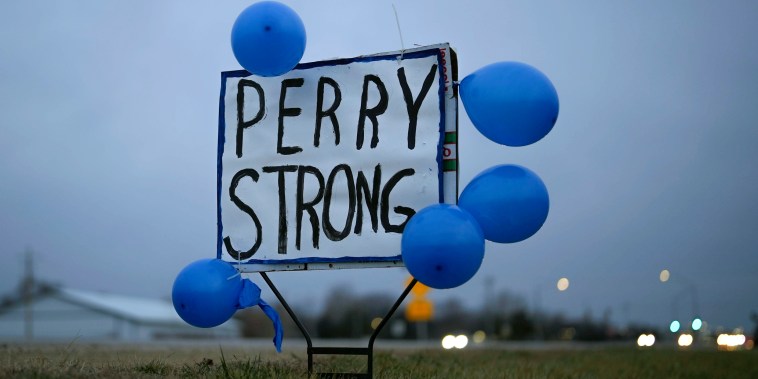 A sign along Highway 141 in Granger, Iowa, shows support for the neighboring community of Perry on Friday, Jan. 5, 2024, following a shooting at the Perry Middle School and High School building the previous day.