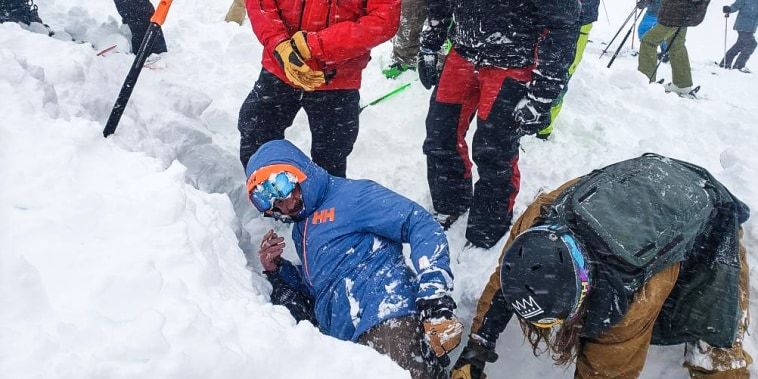 Jason Parker is dug out of the snow from the avalanche at Palisades Tahoe on Jan. 10, 2024.