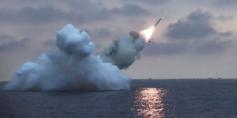A photo provided by the North Korean government shows what it says is a test-firing Sunday of a submarine-launched strategic cruise missile.