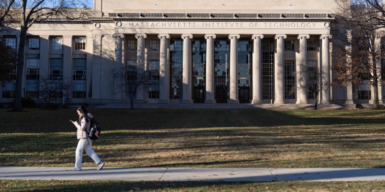 A student walks through the campus of the Massachusetts Institute of Technology in Cambridge, Mass., on Dec. 12, 2023. 