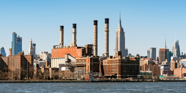 Consolidated Edison Power Plant in Manhattan seen from East River, New York City, empire state building