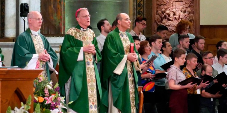 From left, the Rev. James Martin, Archbishop John Wester, and Rev. Eric Andrews at the closing Mass for the Outreach conference in New York