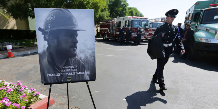 Firefighters arrive to attend a memorial for Charles Morton, the U.S. Forest Service firefighter assigned to the Big Bear Hotshots who was killed in the line of duty on Sept. 17 on the El Dorado Fire, Sept. 25, 2020 at The Rock Church in San Bernardino, Calif.