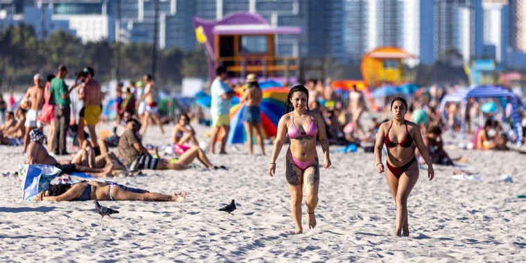 People lounge on South Beach