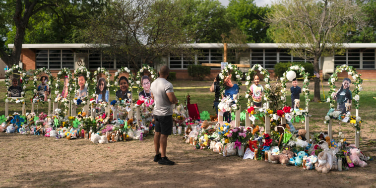 Brian Hackett visits a memorial at Robb Elementary School in Uvalde, Texas