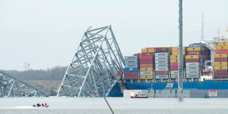 The cargo ship that struck the Francis Scott Key Bridge is surrounded by wreckage, in Baltimore