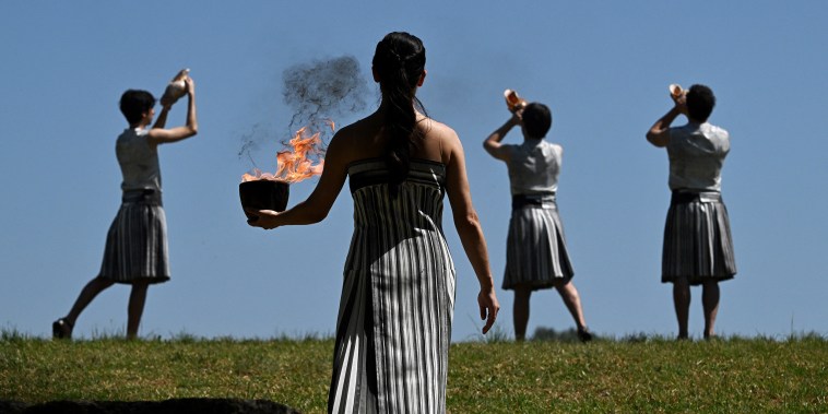 Olympic flame lit in ceremony at ancient Greek site ahead of Paris games
