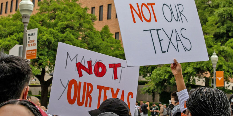 Students protest layoff at the University of Texas at Austin on Monday, April 15, 2024.