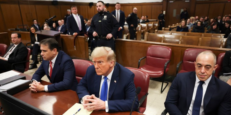 Donald Trump, awaits the start of proceedings at Manhattan criminal court 