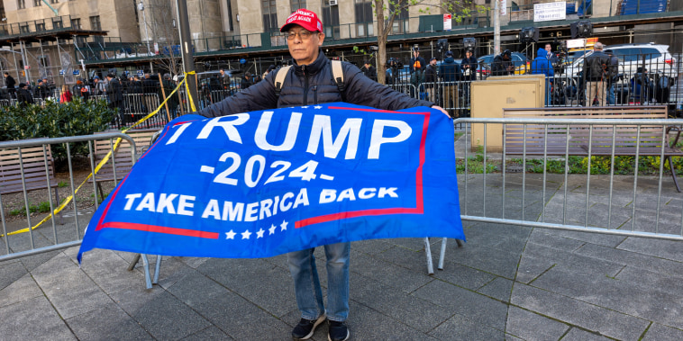 A supporter of Donald Trump outside Manhattan Criminal Court in New York City