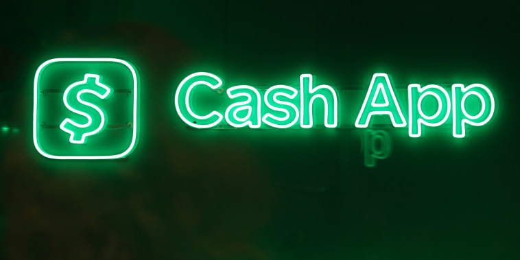 A sign for Cash App is displayed at a New York Fashion Week party in New York City