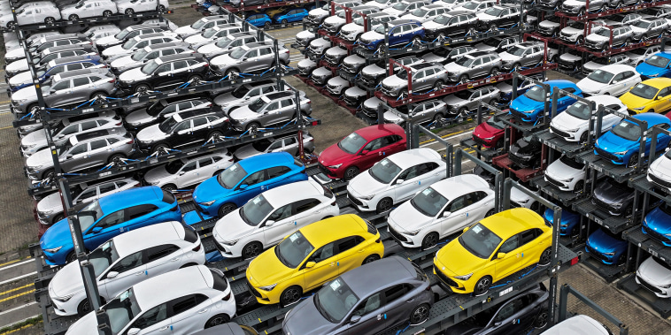 cina economy ev evs electric cars vehicles transport parking lot