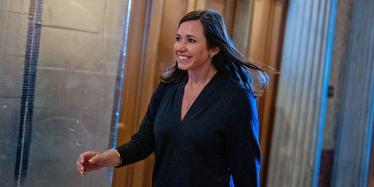Sen. Katie Britt walks into the Senate Chamber 