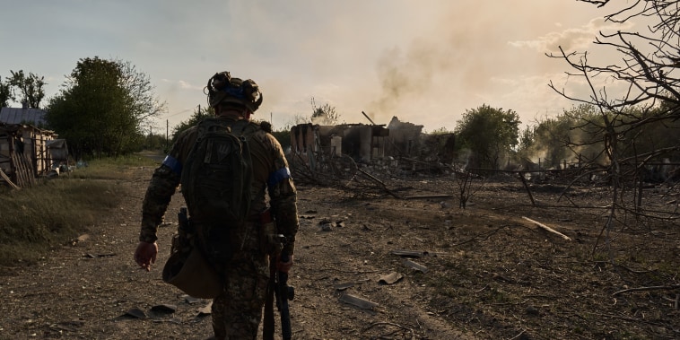 Ukrainian soldiers defend the frontline, which passes through the Ukrainian boarder city of Vovchansk, in Chuhuiv Raion, Kharkiv Oblast
