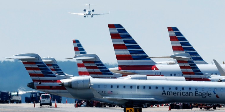 File photo shows passenger planes parked at Reagan National Airport in Arlington, Virginia, on August 8, 2024. 