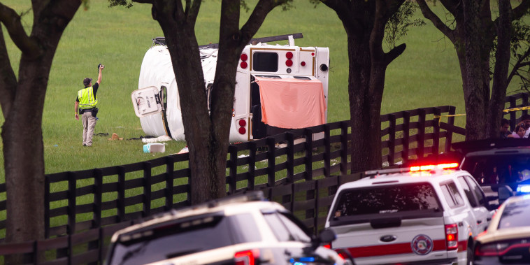 Emergency workers at the scene of a fatal bus crash