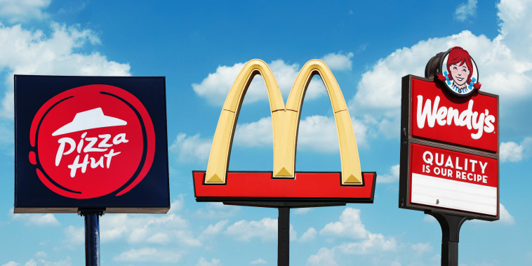 photo collage of pizza hut, mcdonalds, and wendy's signs on a cloudy backdrop