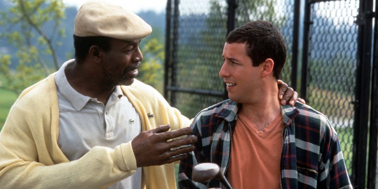 Carl Weathers talks to Adam Sandler in a scene from the film 'Happy Gilmore', 1996.