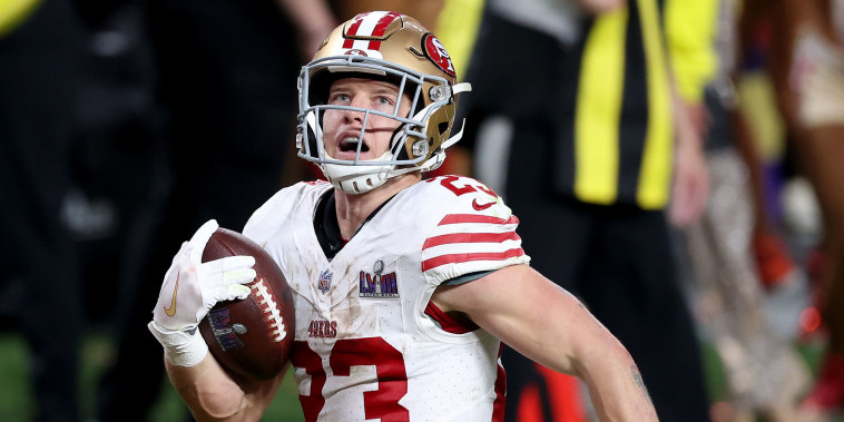 Christian McCaffrey #23 of the San Francisco 49ers runs the ball for a touchdown in the second quarter against the Kansas City Chiefs 