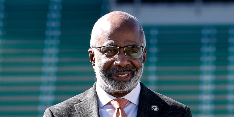 Larry Robinson speaks during a news conference