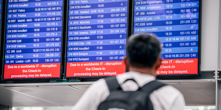 A general view from Dusseldorf Airport as passengers gather and wait due to the global communications outage