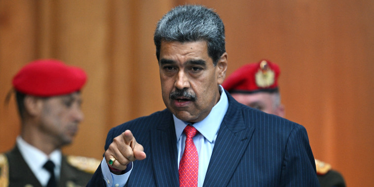 Venezuelan President Nicolas Maduro leaves a news conference about the presidential election at the Miraflores presidential palace in Caracas on July 31, 2024.