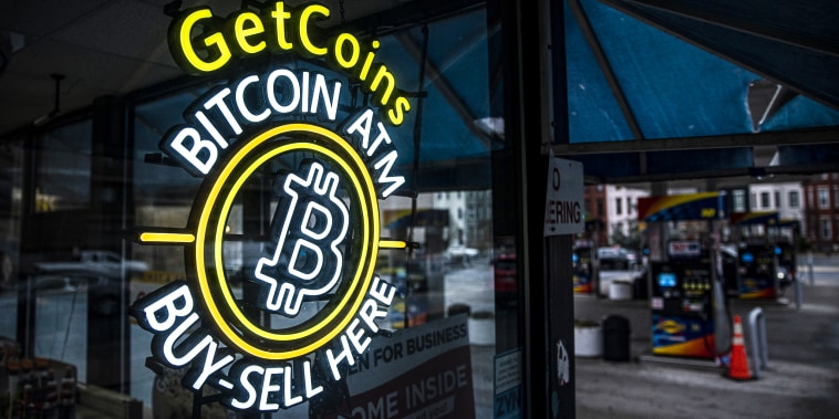 A sign for a Bitcoin automated teller machine