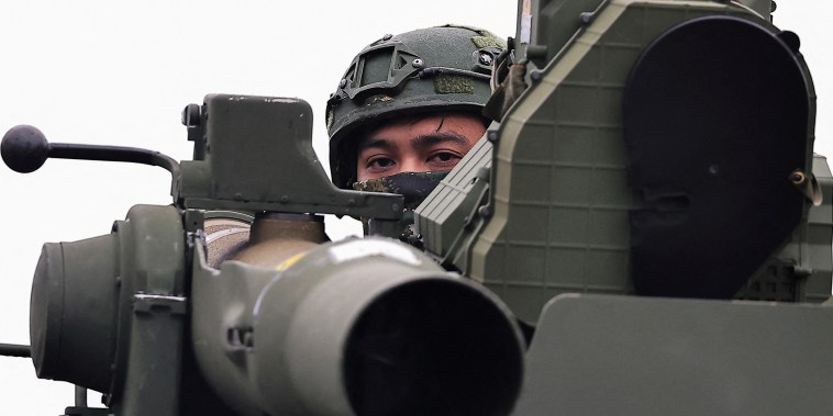 FILE PHOTO: A soldier stands on an M1167 TOW carrier vehicle at the Fangshan training grounds in Pingtung