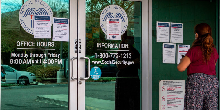 A woman outside a Social Security Office