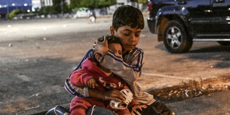 Lebanese civilians fleeing from Dahiyeh neighborhood stay at streets due to Israeli attacks