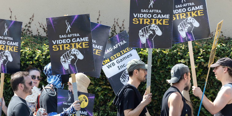 Video game actors picket Warner Bros. Studio