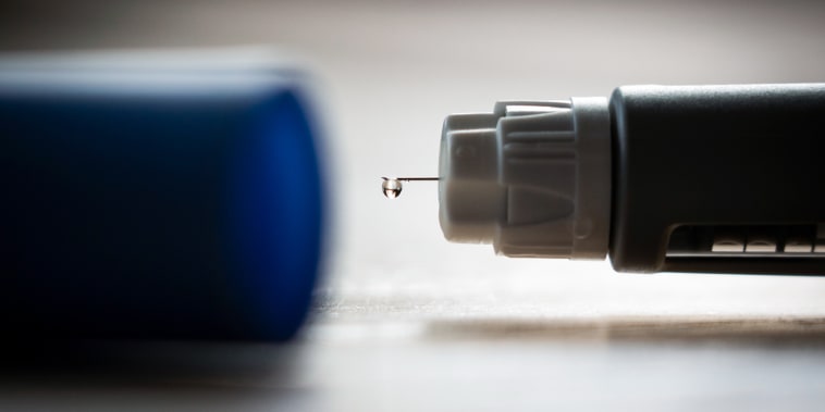 An Ozempic (semaglutide) injection pen is seen on a kitchen table