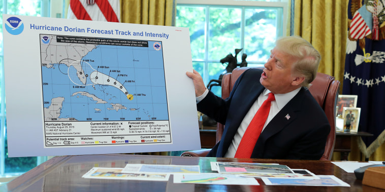 U.S. President Trump receives a Hurricane Dorian update at the White House in Washington