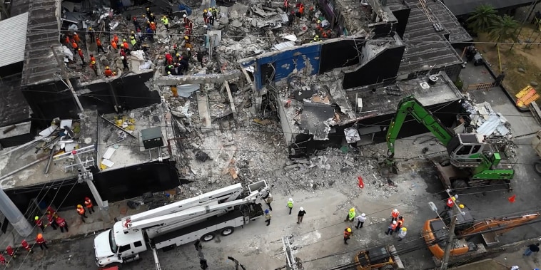 An aerial view shows rescue teams working at the Jet Set nightclub a day after the collapse of its roof in Santo Domingo on April 9, 2025. 