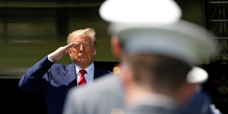 President Donald Trump salutes after speaking to cadets in the Class of 2020 at the West Point commencement.