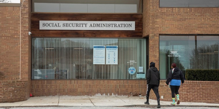 People enter a Social Security Administration office in suburban Detroit on March 7, 2025.  