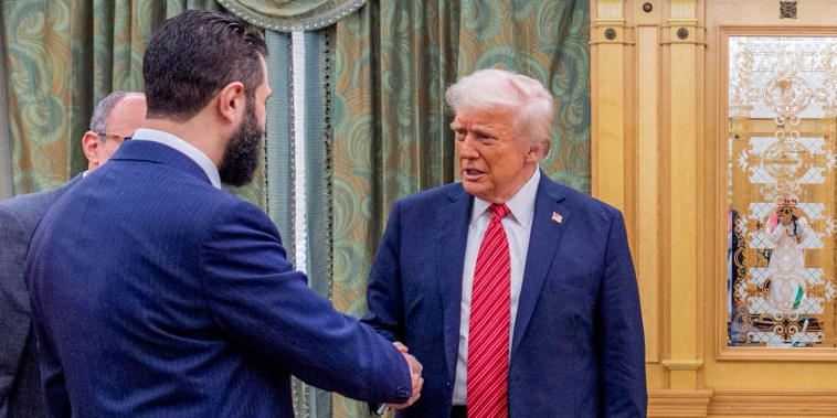 Ahmed al-Sharra meets with Donald Trump.