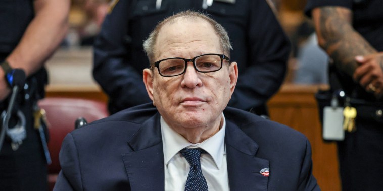 Harvey Weinstein seated in court