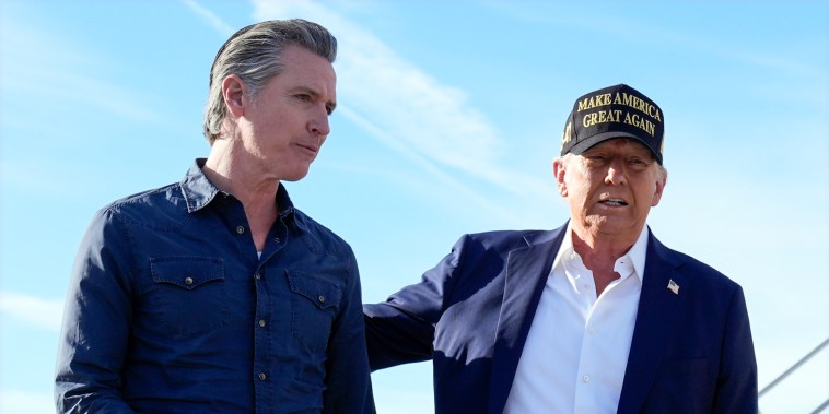 Gavin Newsom, left, and Donald Trump walk outside