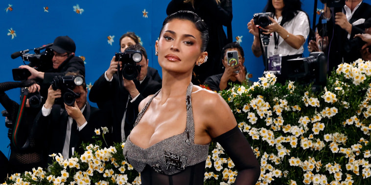 Kylie Jenner posing as she arrives at the Met Gala