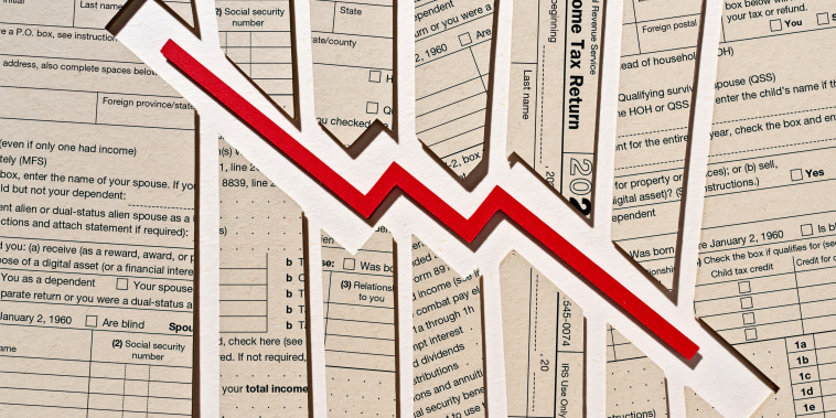 Photo Illustration: a downward trending arrow set against tax return forms